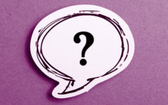 It’s time to talk about the future of PE returns Question mark speech bubble isolated on purple background