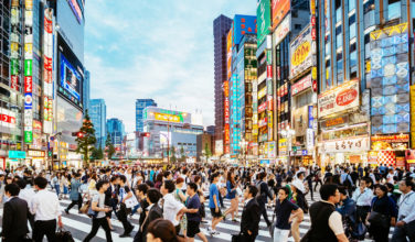 Japanese GP returns entire debut fund with first exit Crowds of people crossing the street in Tokyo, Japan