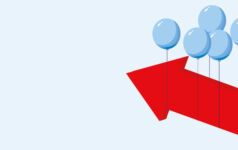 Balloons lifting up a big red arrow