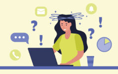 A woman working at a laptop appears bamboozled by regulation