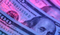 Hundred dollar bill in abstract lighting