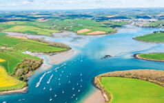 How UK Local Government Pension Schemes became a major impact investor Boats moored in the estuary of Salcombe in Devon