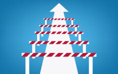 A white arrow leads upwards, obscured by hurdles cradled over it