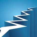 An illustration of a businessperson standing at the beginning of a long, zig-zagging road
