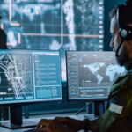 Private equity prepares for battle in its pivot towards defence A military command and communications centre with operatives looking at urban maps on computer screens