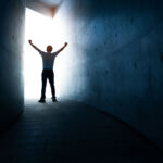 A new hope: What GPs expect from private equity in 2026 A man standing in the light at the end of a dark tunnel