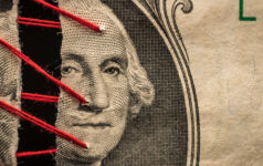 Stressed out: How private equity is weathering higher-for-longer PEI Feb26 cover image torn US dollar bill