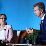 Holden Spaht on stage with PE Hub's MK Flynn at PEI Group's NEXUS 2026.
