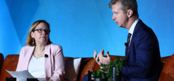 Holden Spaht on stage with PE Hub's MK Flynn at PEI Group's NEXUS 2026.