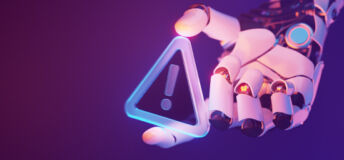 A robotic hand holds a sign that signals an emergency
