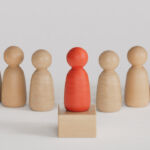Wooden figures line up t5