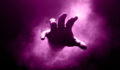 hand coming out of the fog