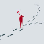 Hamilton Lane: ‘Evergreen hesitancy only temporary’ A red silhouette of a man scratching his head beneath a red question mark, standing where a path of footprints splits into two directions.