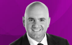 Headshot of Adam Buzanis