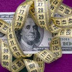 Side Letter: On your marks 100 dollar bill with measuring tape