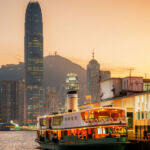 Sports specialist RedBird bulks up in APAC Scenery of Victoria Harbor of Hong Kong city at dusk
